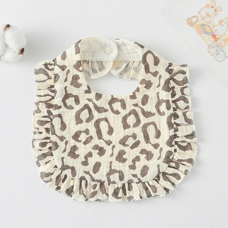 Pack of six baby muslin bibs with animal bandana prints and adjustable snap fasteners