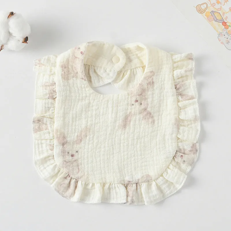 Pack of six baby muslin bibs with animal bandana prints and adjustable snap fasteners