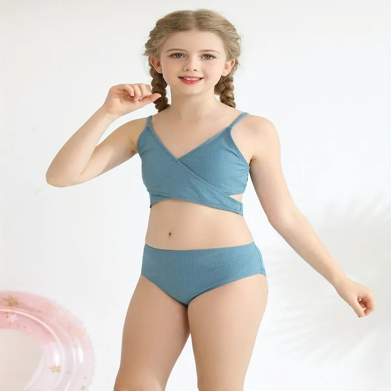 Girls two-piece criss-cross swimsuit set in blue green with polypropylene fabric