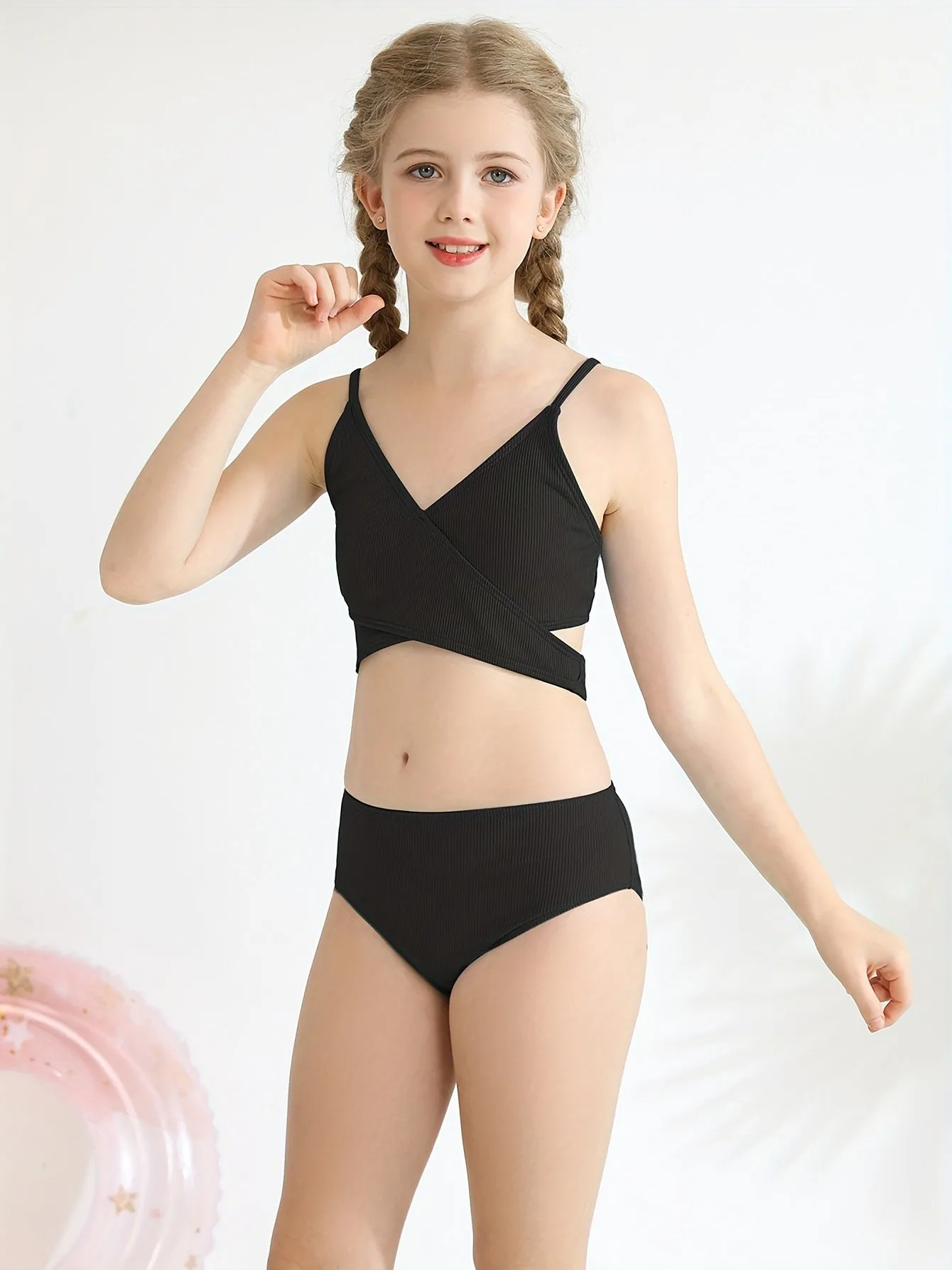 Girls two-piece criss-cross swimsuit set in blue green with polypropylene fabric
