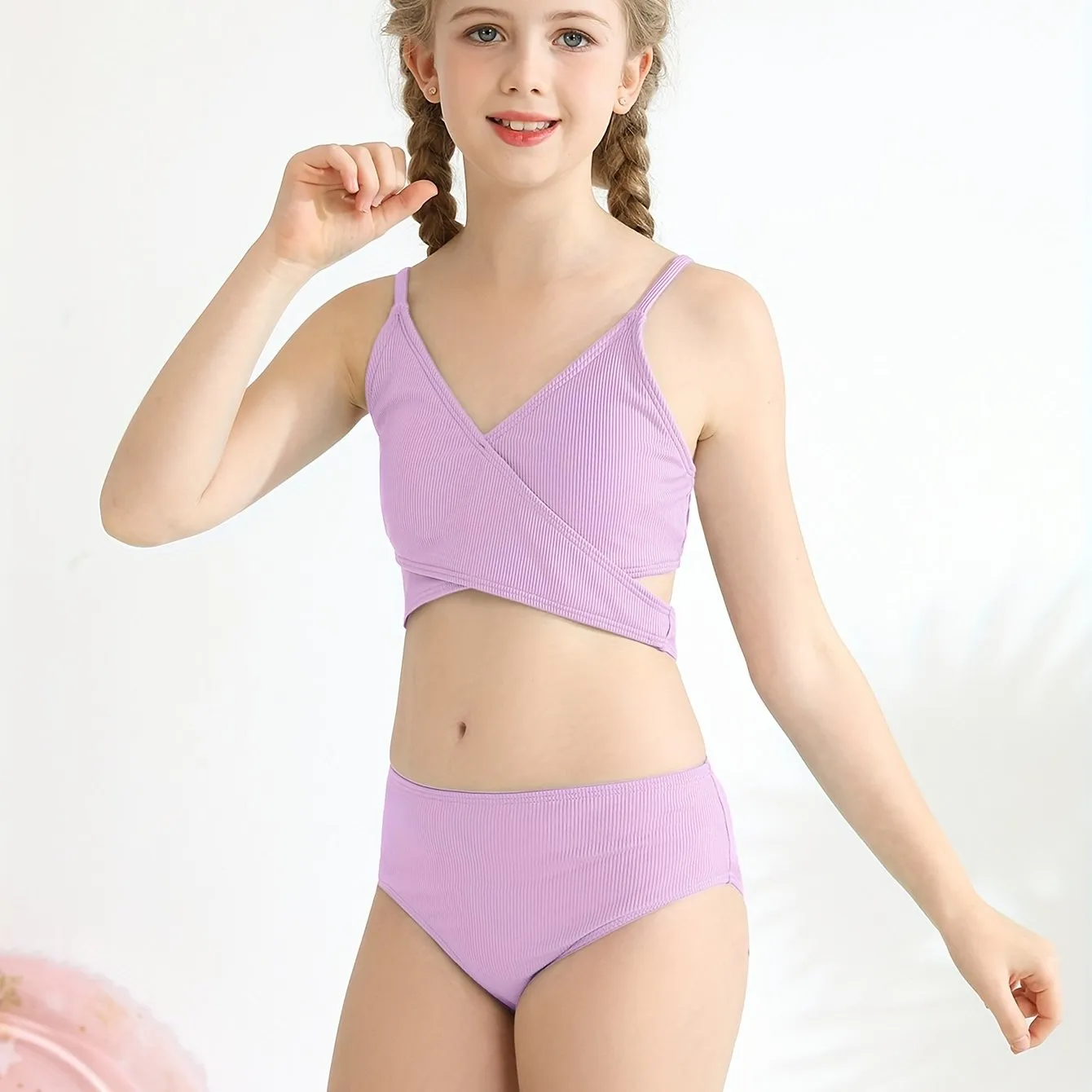 Girls two-piece criss-cross swimsuit set in blue green with polypropylene fabric