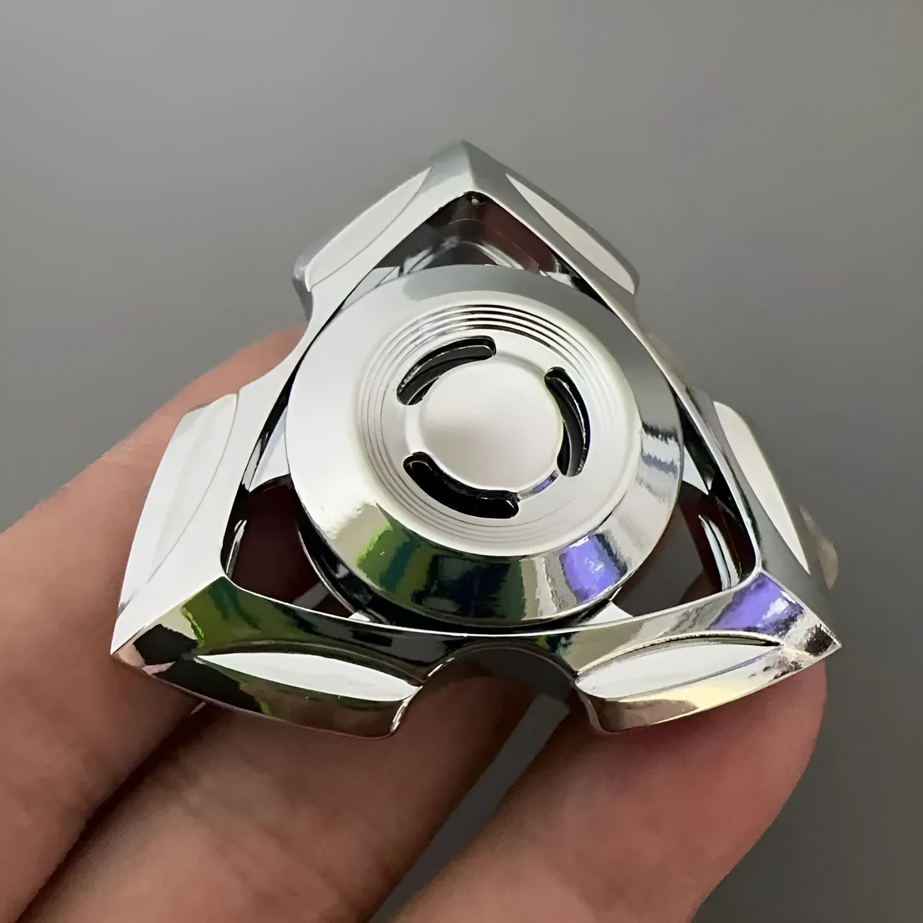Alloy metal fingertip gyro decompression toy in colourful and silver options for youth ages 15-35