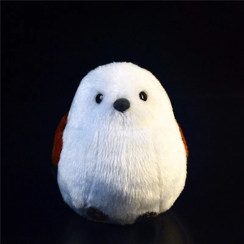 Plush bird decompression ball toy in Kingfisher design, 14cm height, on a desk