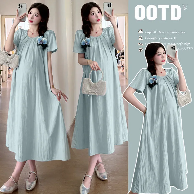 Loose summer maternity dress in sky blue with petal sleeves and nine-quarter length sleeves, street fashion style