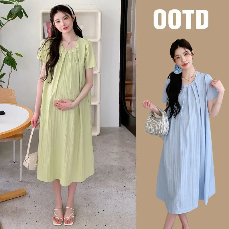Loose summer maternity dress in sky blue with petal sleeves and nine-quarter length sleeves, street fashion style