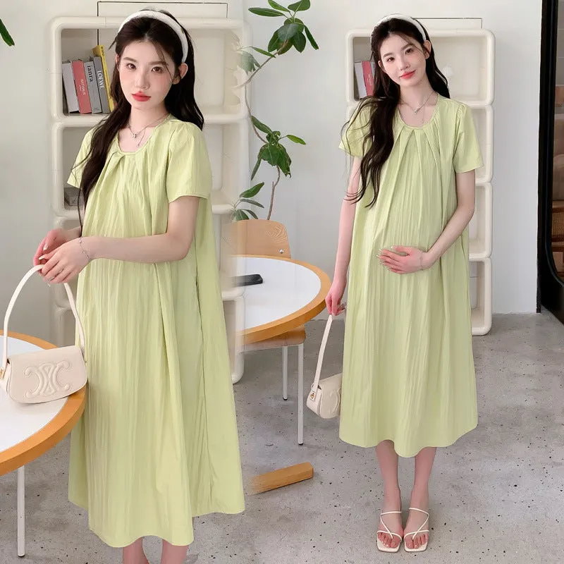Loose summer maternity dress in sky blue with petal sleeves and nine-quarter length sleeves, street fashion style