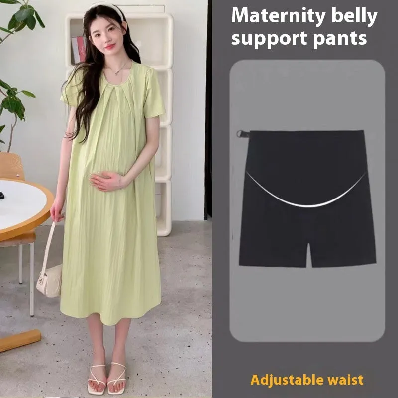 Loose summer maternity dress in sky blue with petal sleeves and nine-quarter length sleeves, street fashion style