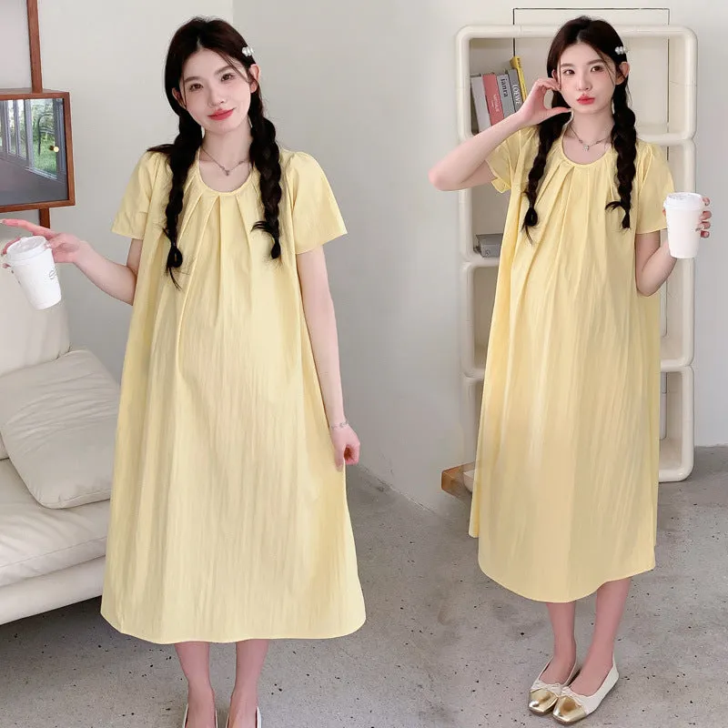 Loose summer maternity dress in sky blue with petal sleeves and nine-quarter length sleeves, street fashion style