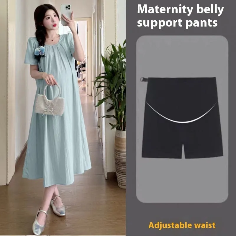 Loose summer maternity dress in sky blue with petal sleeves and nine-quarter length sleeves, street fashion style