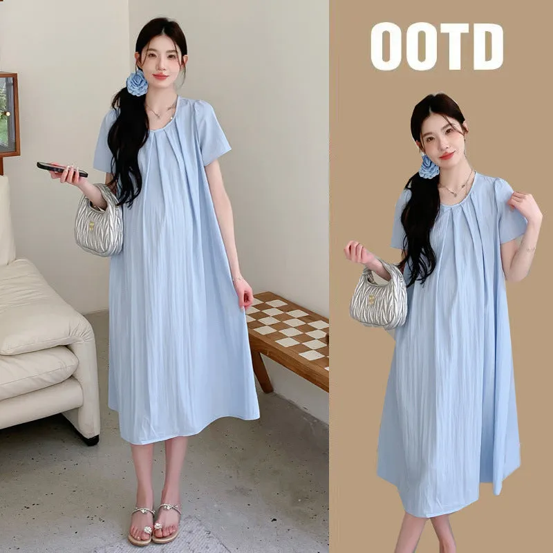Loose summer maternity dress in sky blue with petal sleeves and nine-quarter length sleeves, street fashion style