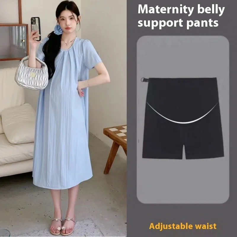 Loose summer maternity dress in sky blue with petal sleeves and nine-quarter length sleeves, street fashion style