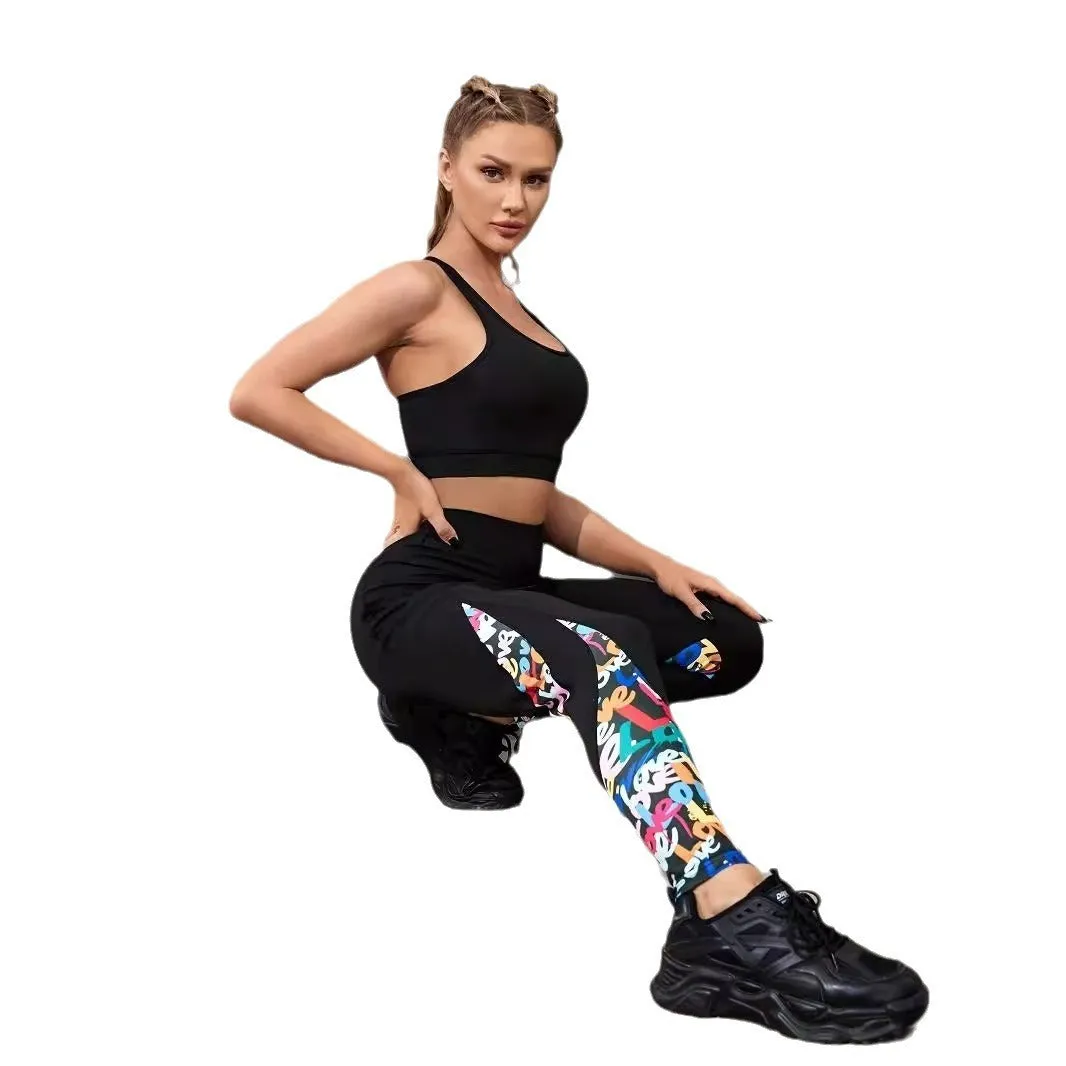 Black women's high-waisted yoga leggings with contrast patchwork design and side pocket.