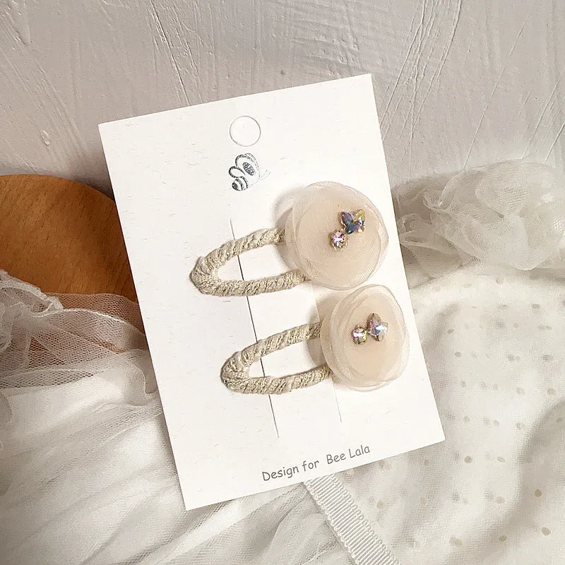 Children's press clip hair accessories set with cloth bows, sequins, pearls, and crystal flowers in pink and beige