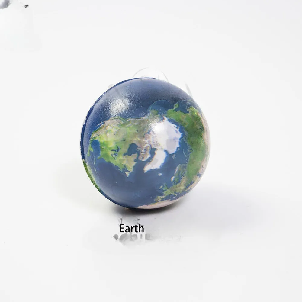 Set of eight solar system planet stress balls plus moon and sun in soft PU foam on white background