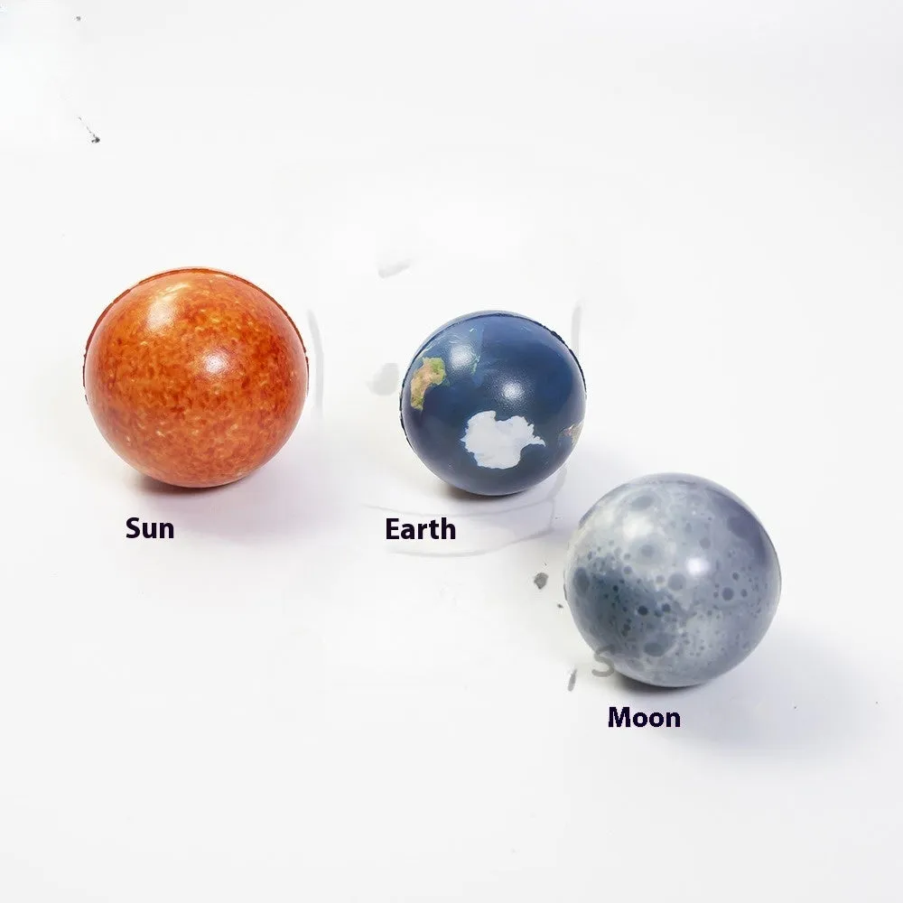 Set of eight solar system planet stress balls plus moon and sun in soft PU foam on white background