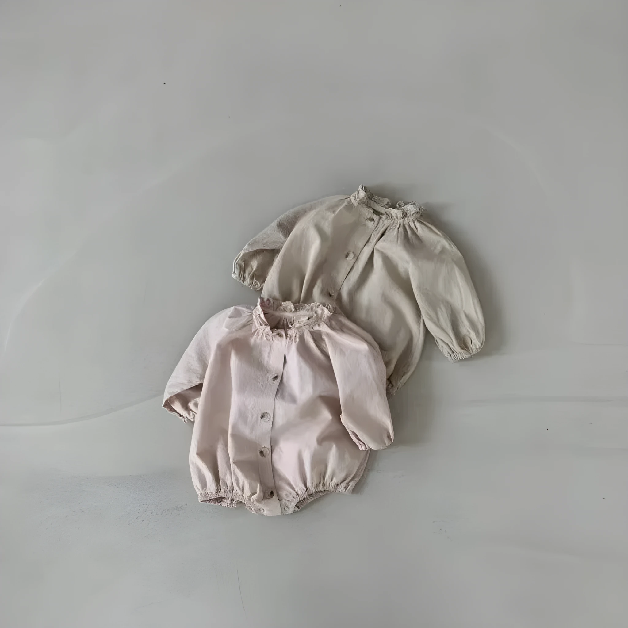 Cotton long sleeve jumpsuit romper with wooden buttons for baby girls in light lotus pink and khaki