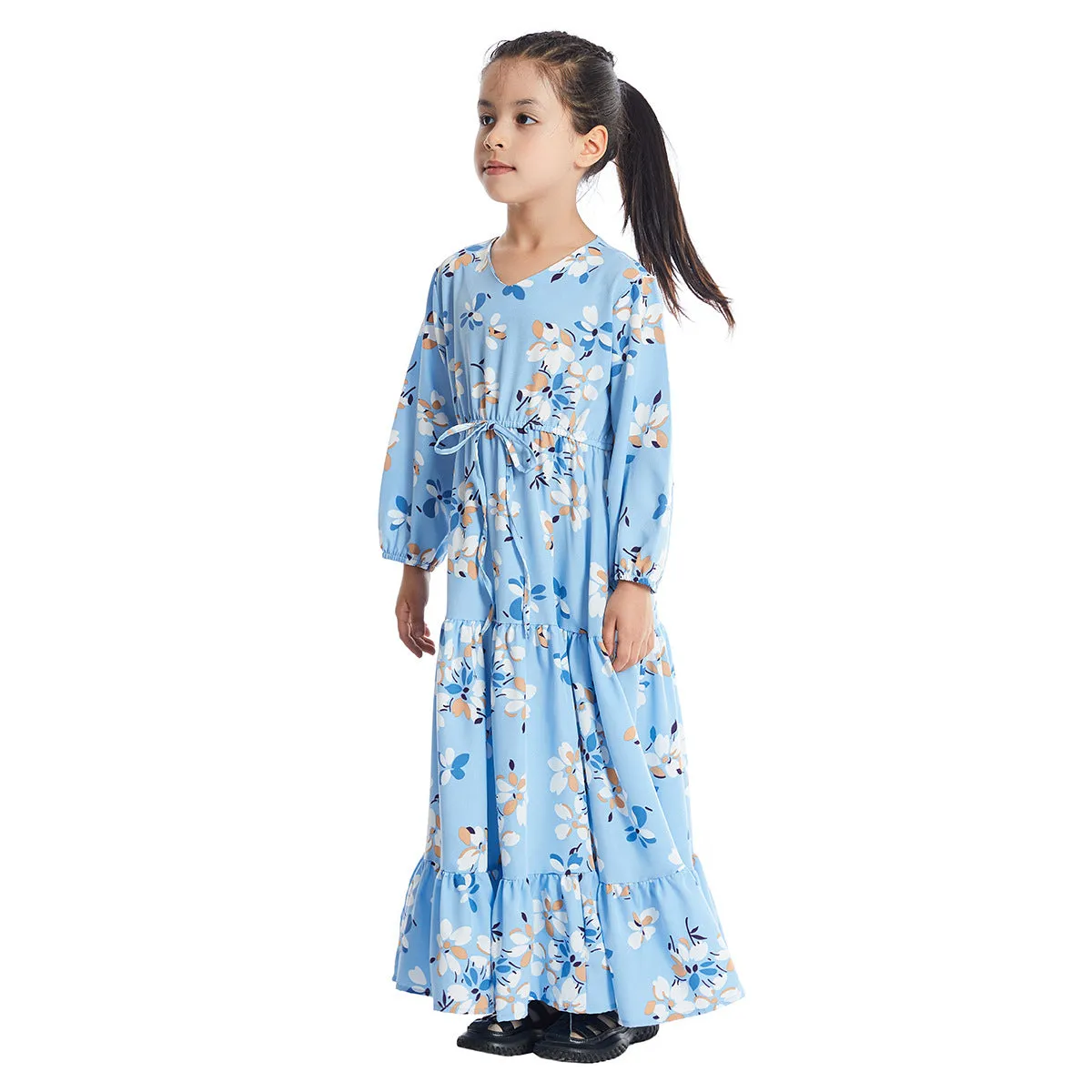 Girl wearing a long sleeve floral polyester dress with a flounced skirt in beige, available in heights 100-160cm