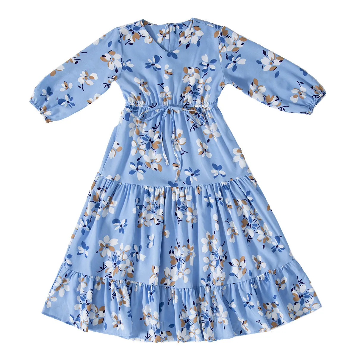 Girl wearing a long sleeve floral polyester dress with a flounced skirt in beige, available in heights 100-160cm