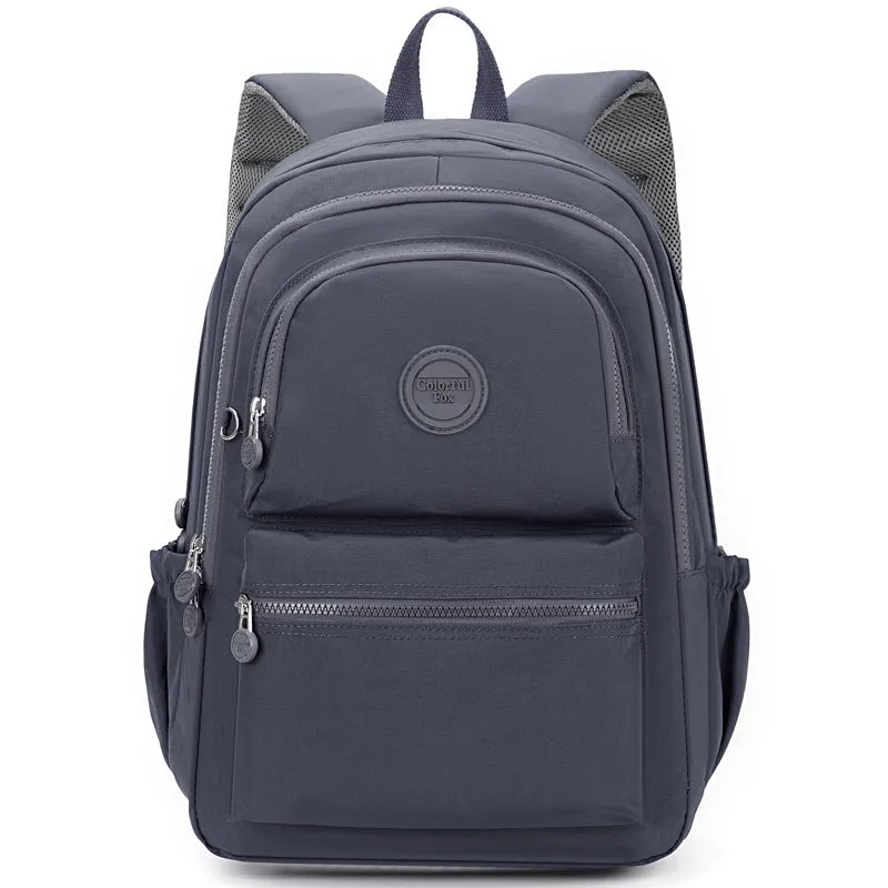 Women's nylon travel backpack in Azure Stone Green showing multiple compartments and organisational features