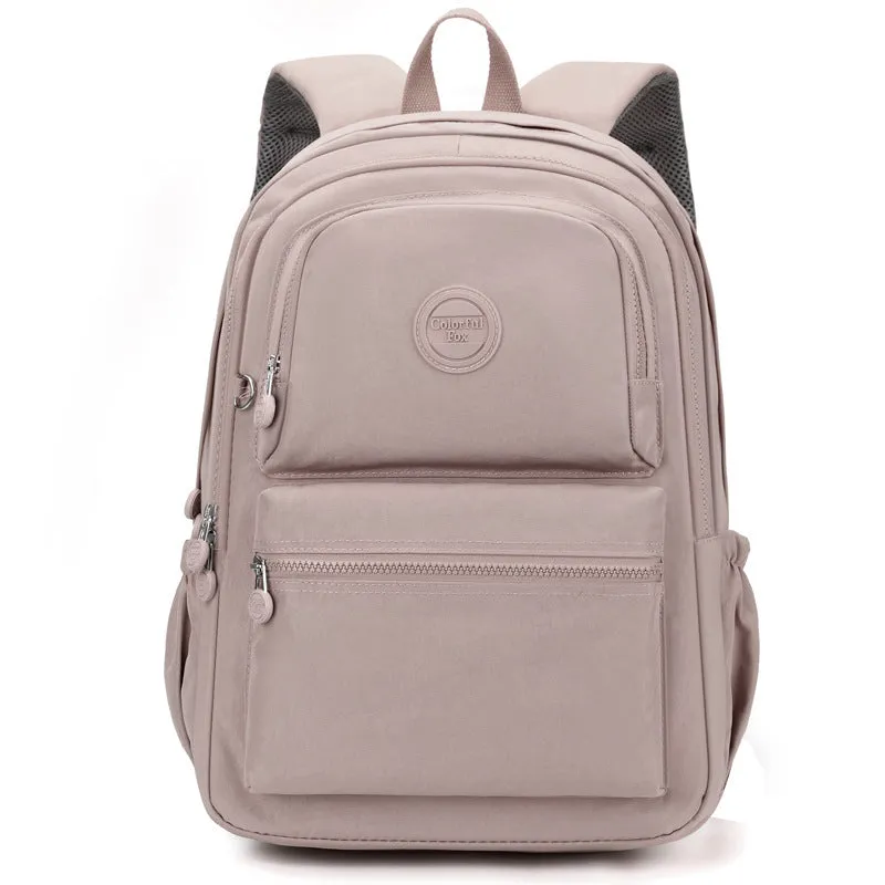 Women's nylon travel backpack in Azure Stone Green showing multiple compartments and organisational features