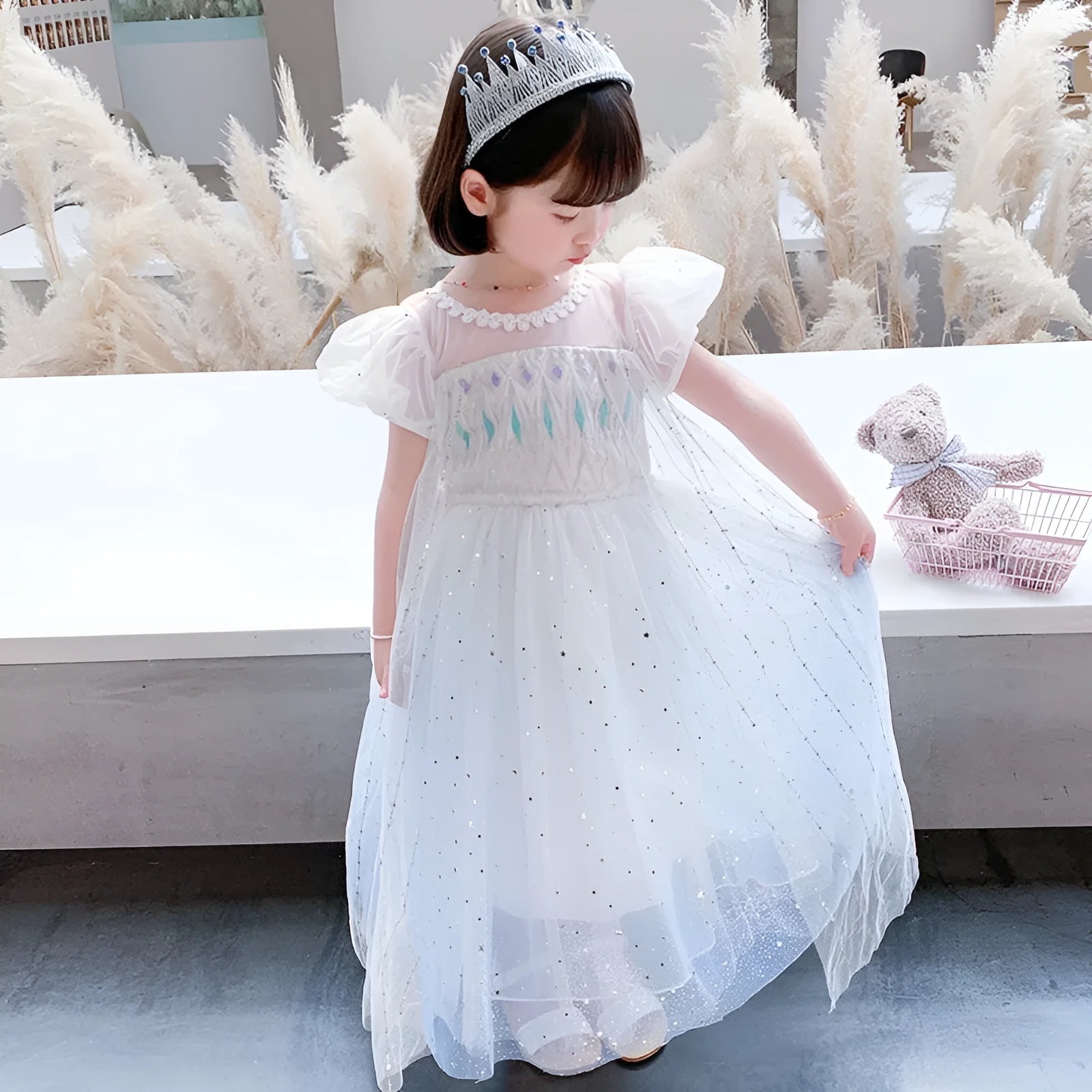 Girls Princess Elsa dress in cotton with short sleeves and A-line skirt, available in gradient blue and silver cloak colour options