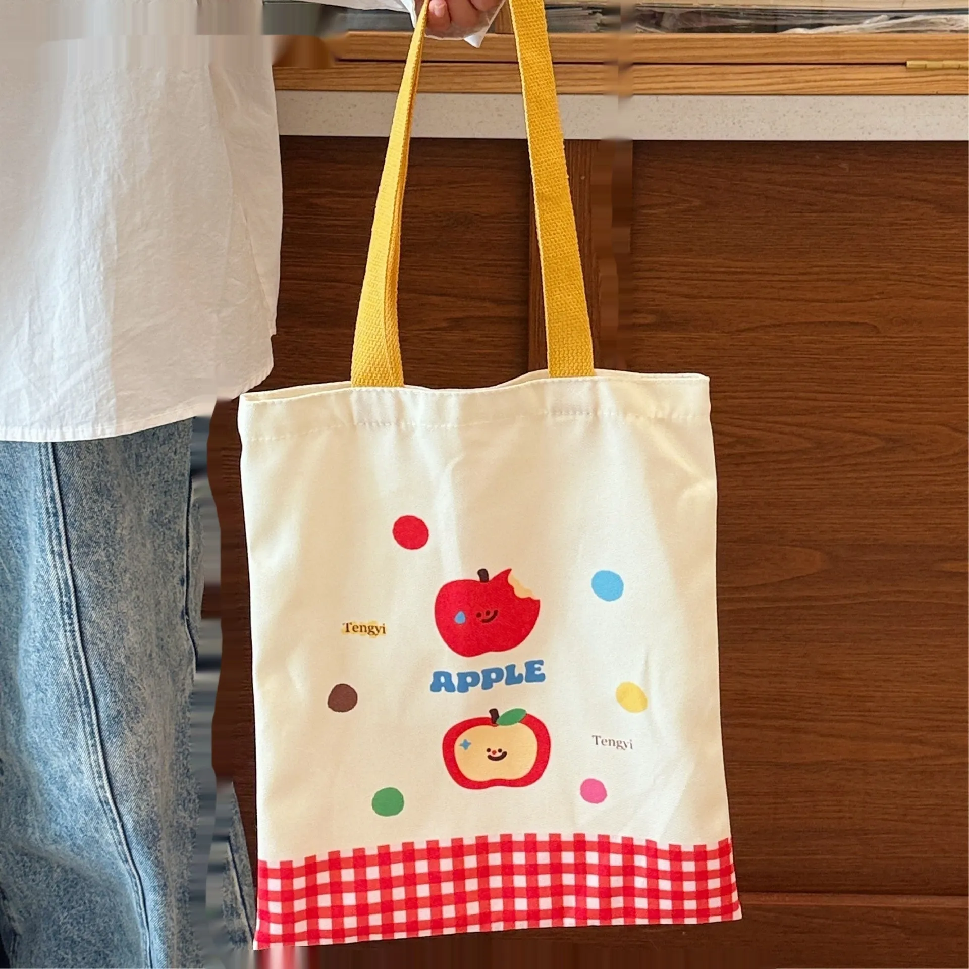 Cartoon print canvas handbag with kitten design measuring 30cm wide by 36cm high