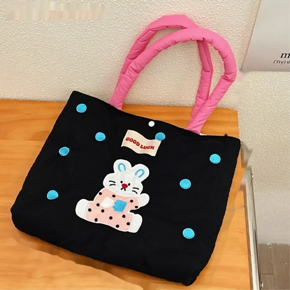 Cartoon print canvas handbag with kitten design measuring 30cm wide by 36cm high