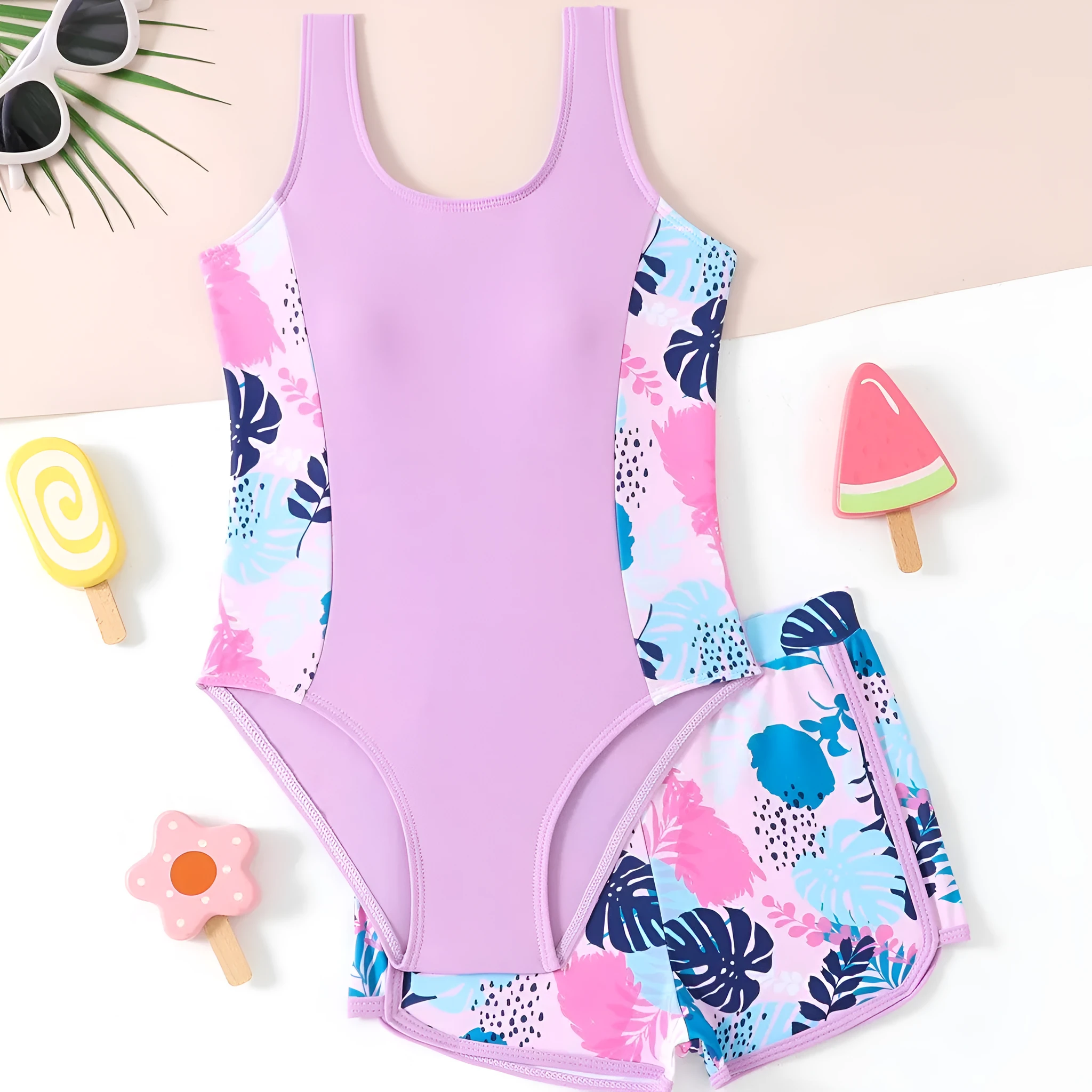 Girls two-piece swimsuit set with one-piece top and boxer shorts in purple, blue, and rose red