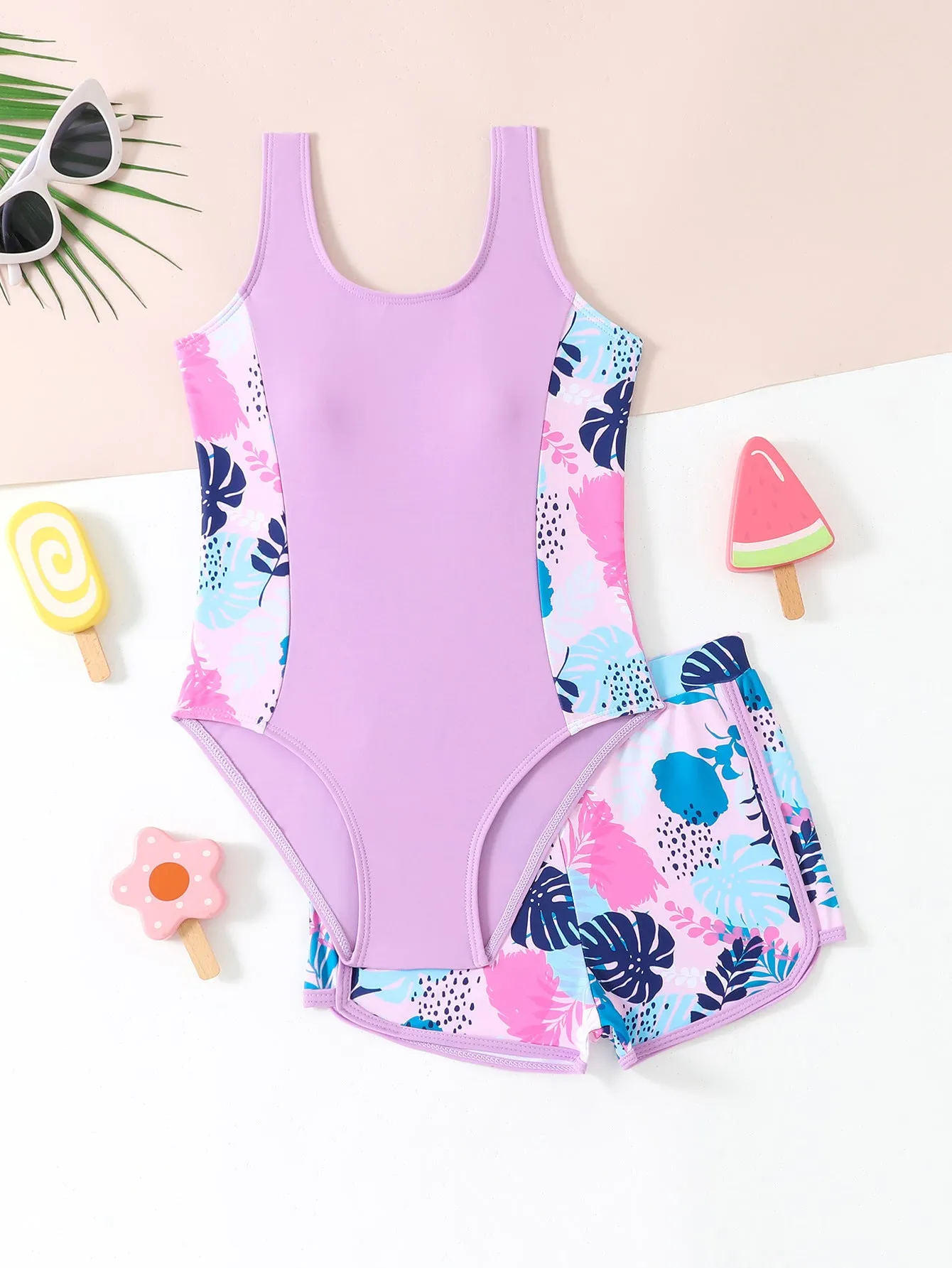 Girls two-piece swimsuit set with one-piece top and boxer shorts in purple, blue, and rose red