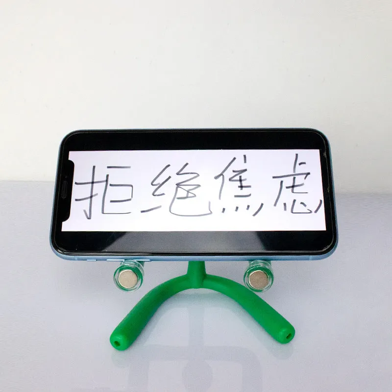 Green plastic decompression toy figure in iron box with reject anxiety text, for desk decoration and stress relief