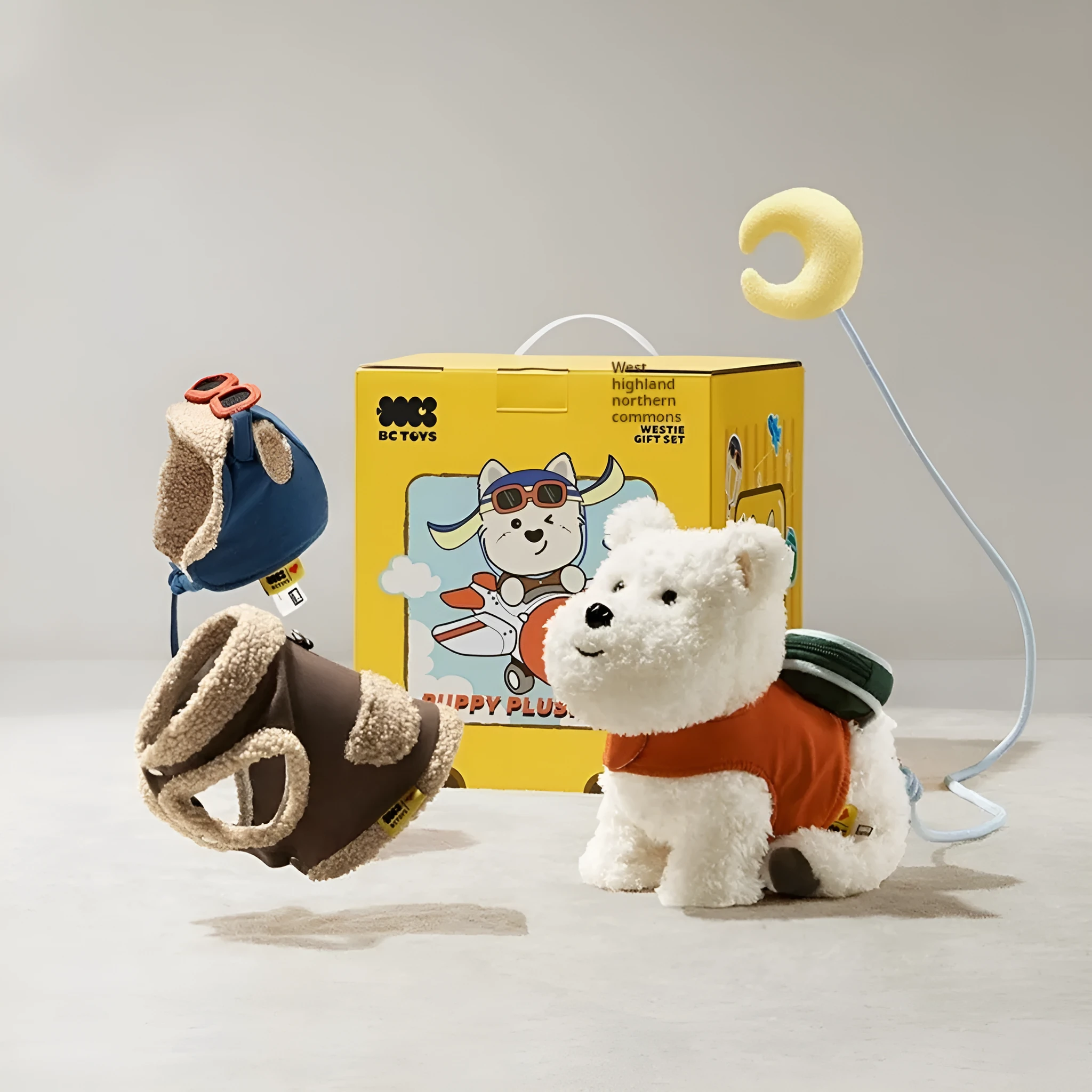 Babycare West Highland plush dog gift box set with two clothes on display