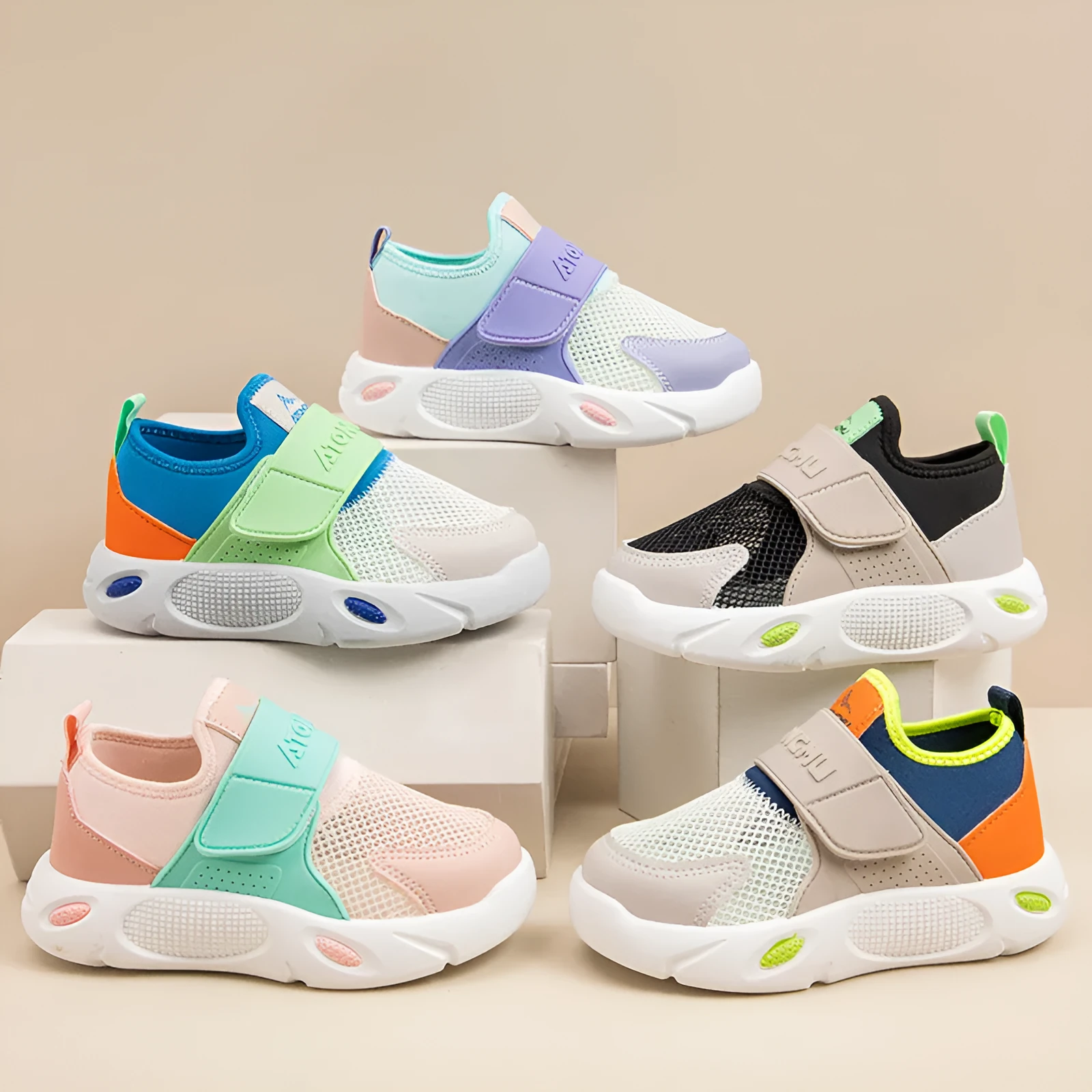 Children's slip-on shoes with soft rubber sole and PU upper in blue green colour on white background