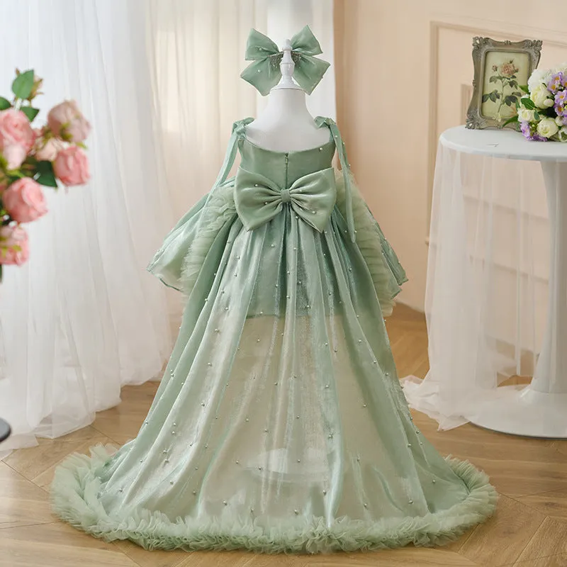 Green large trailing mesh children's dress on display, suitable for heights 80cm to 160cm, polyester fibre construction.