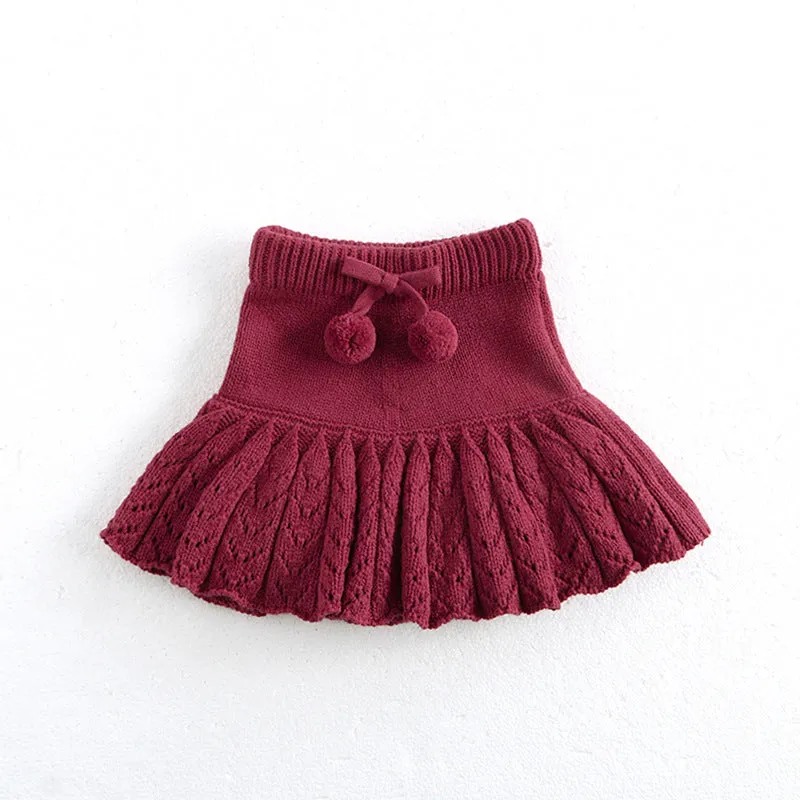 Girls hollow retro pleated pantskirt in light gray purple cotton, front view, on child of about 90cm height