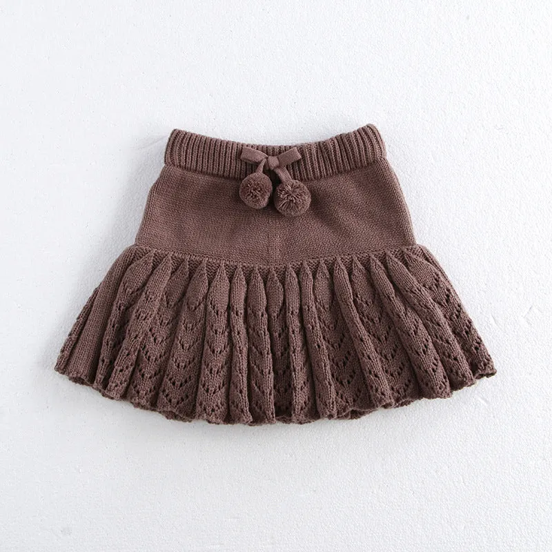 Girls hollow retro pleated pantskirt in light gray purple cotton, front view, on child of about 90cm height