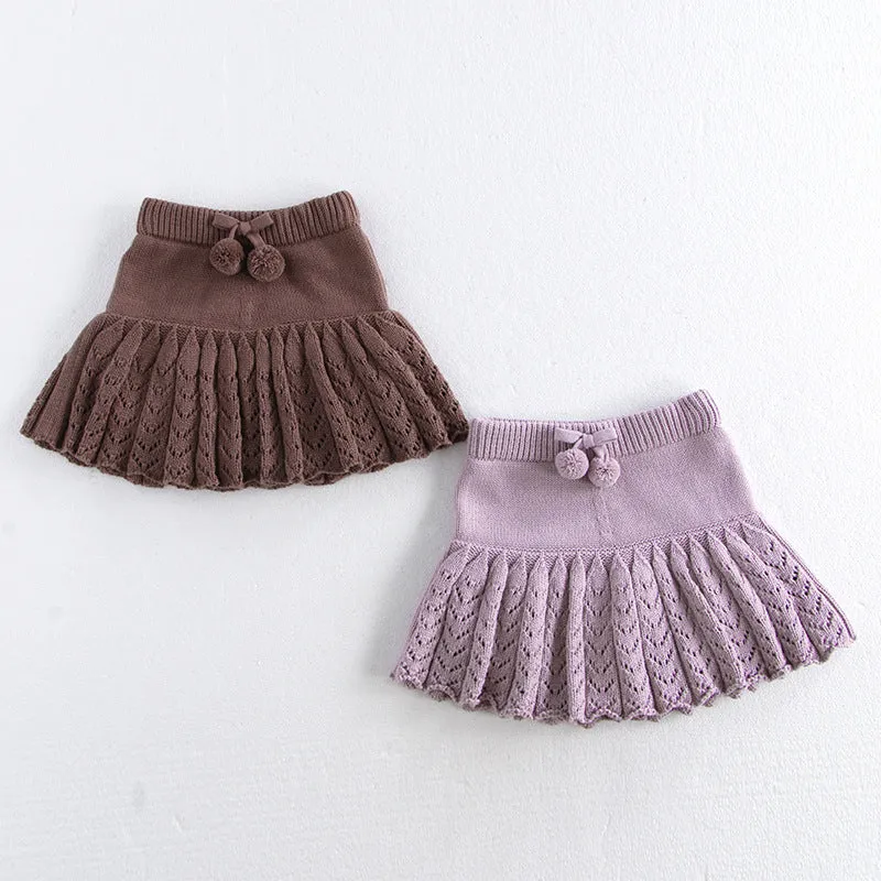 Girls hollow retro pleated pantskirt in light gray purple cotton, front view, on child of about 90cm height
