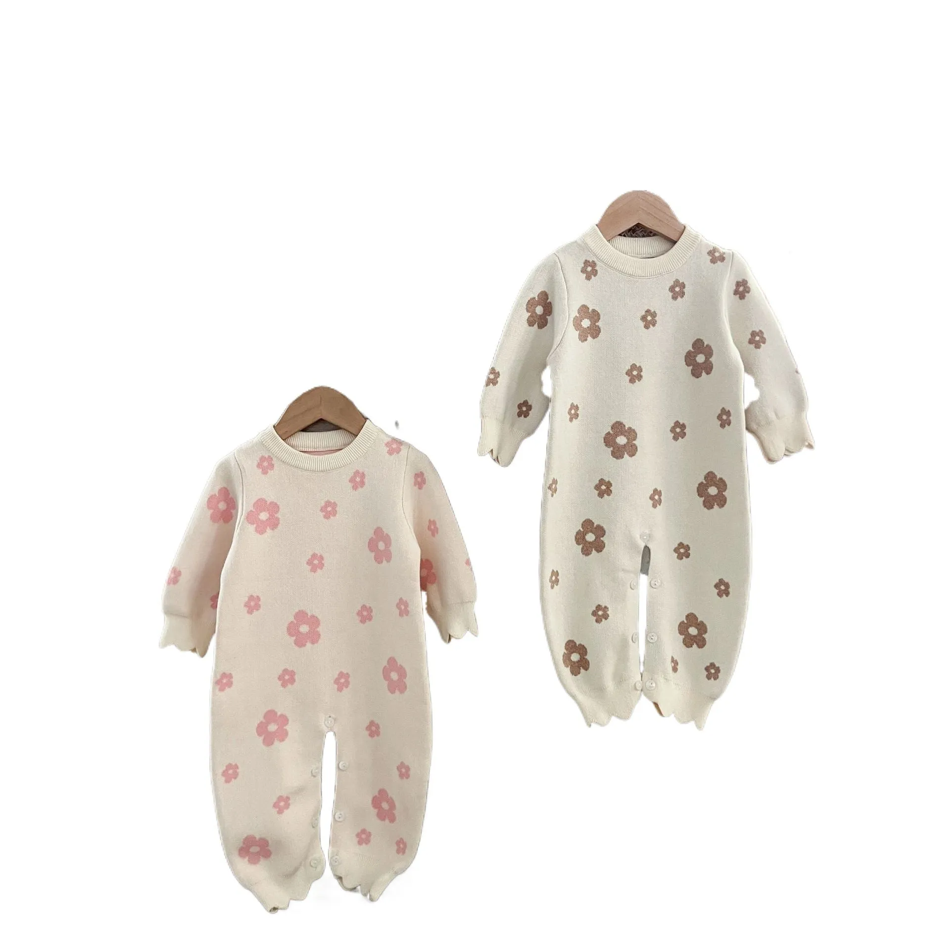 Baby romper jumpsuit in cotton with long sleeves, pink flowers pattern, side view
