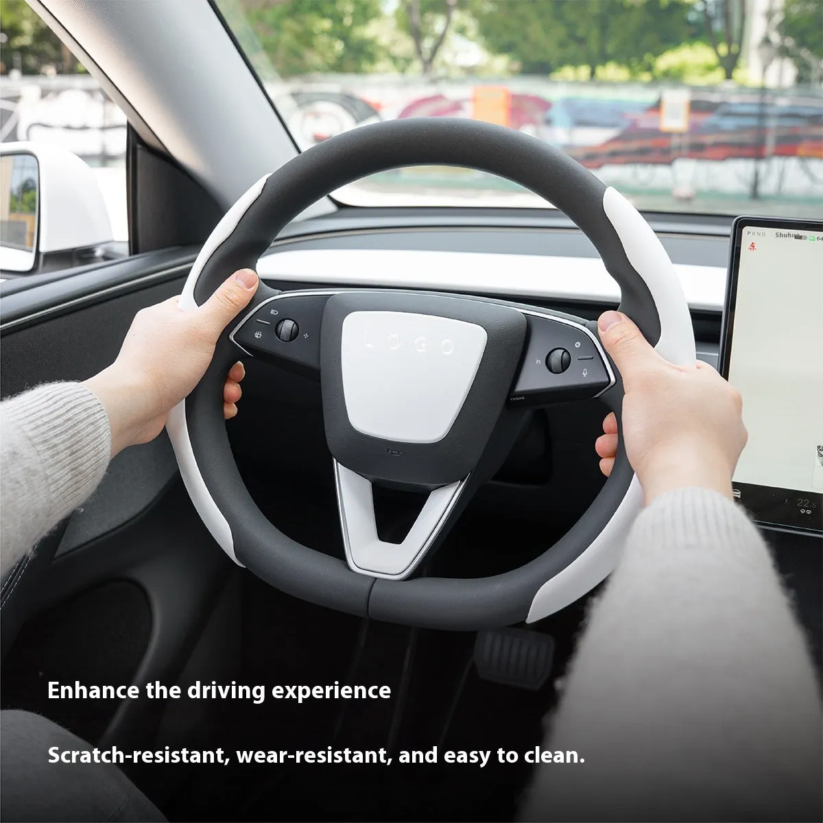 White steering wheel protective patch with decorative shell design on car steering wheel