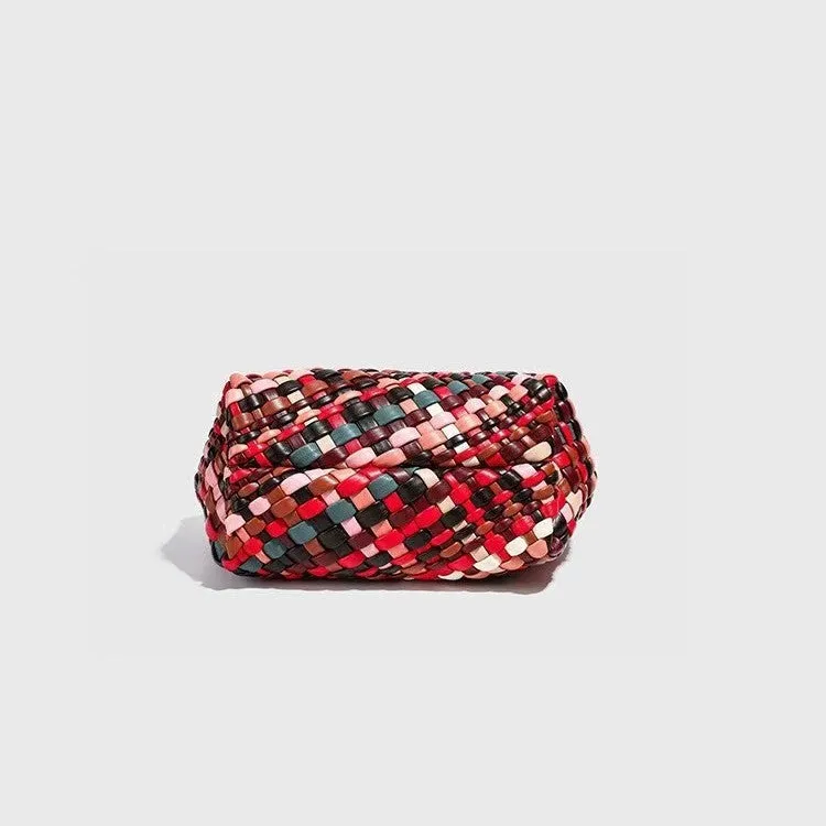 Women's colourful woven PU leather shoulder bag showing handmade texture