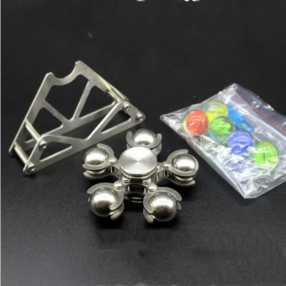 Silver spinning creative ferris wheel fingertip gyro on a neutral background
