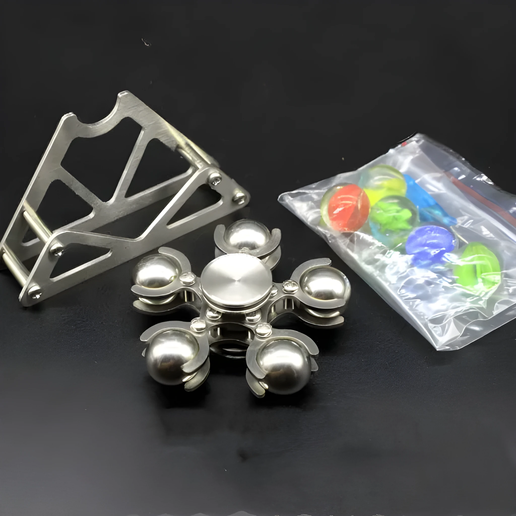 Silver spinning creative ferris wheel fingertip gyro on a neutral background