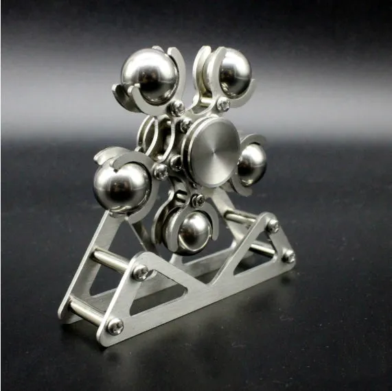 Silver spinning creative ferris wheel fingertip gyro on a neutral background