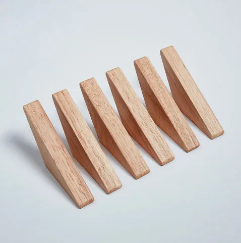 Triangle rubber wood wall hook with modern minimalist design for hanging coats and bags