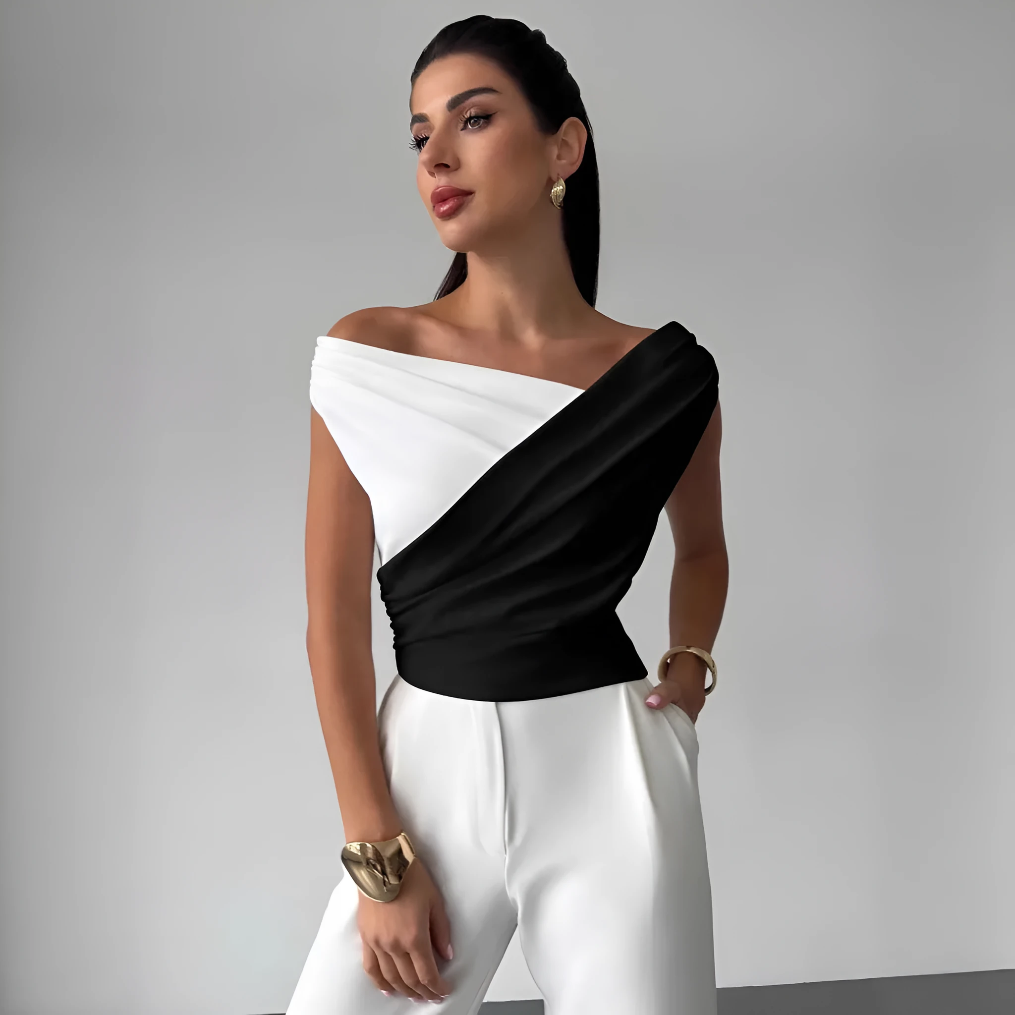Colour-blocked asymmetric shoulder ruffled hem slim-fit polyester top for women in black with white panels