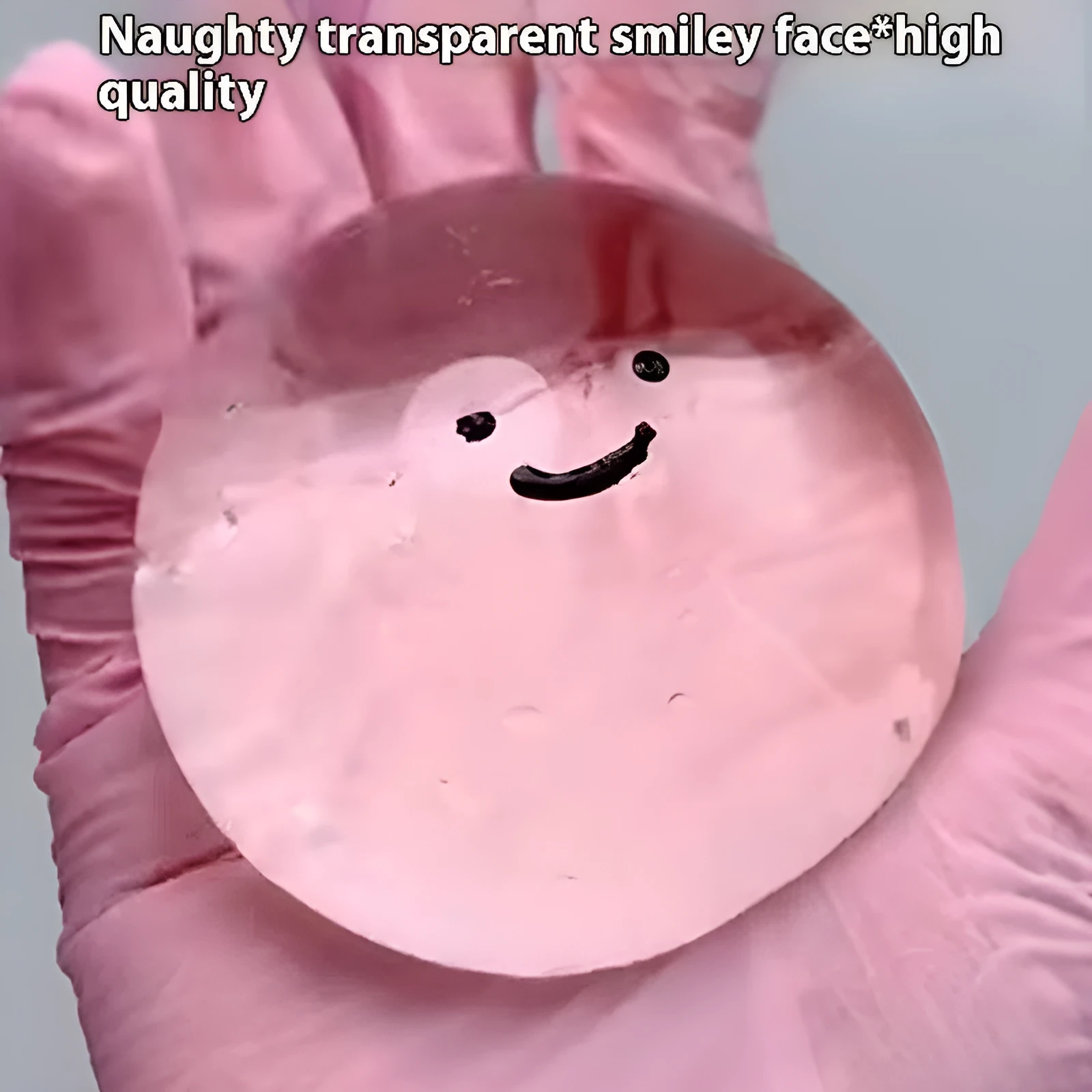Decompression bubble slow rebound compressable musical toy in pink smiley ball design, made from TPR material for children's stress relief and sensory play
