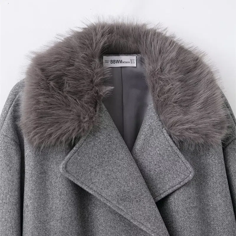 Women's grey mid-length hooded belted wool cape coat with raccoon fur collar and pockets