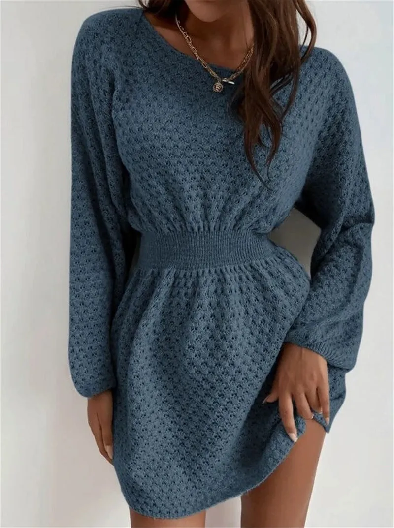 Blue women's knitted dress with crocheted flower details, round neck, fitted waist, and long sleeves.