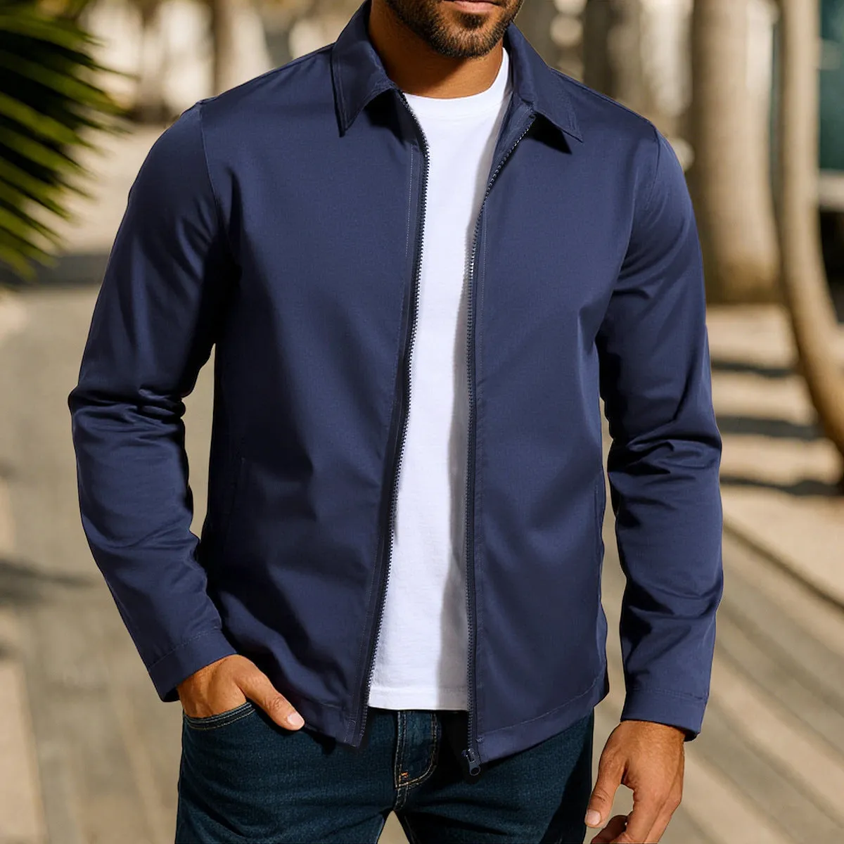 Man wearing a green zip-up cardigan jacket with raglan sleeves on a casual day out.