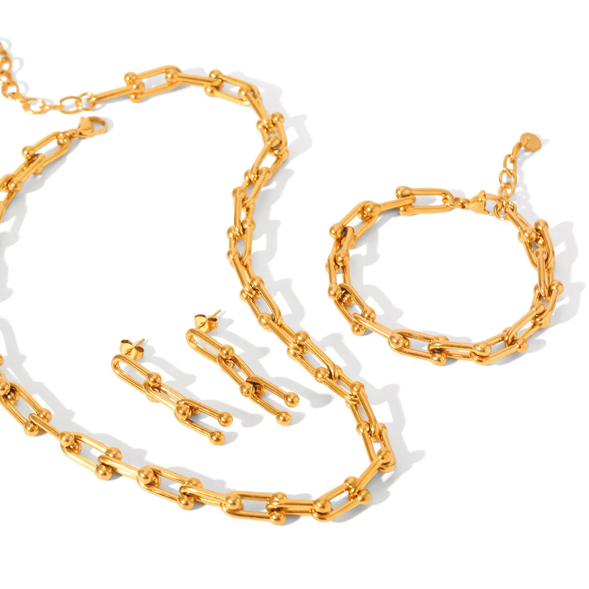 Stainless steel necklace, bracelet, and earring set with a titanium steel horseshoe pendant.