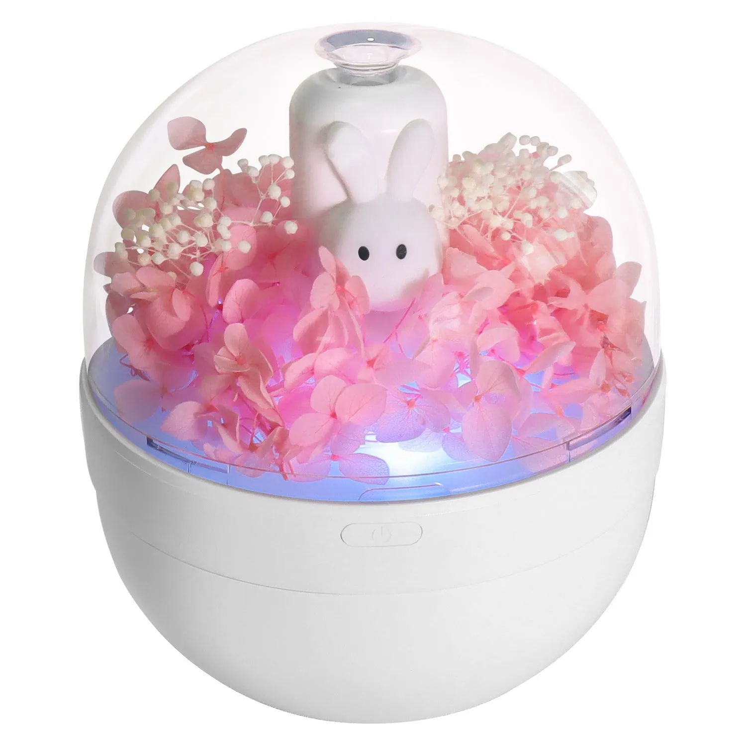 Pink creative rabbit-shaped aromatherapy humidifier with preserved flowers on top.